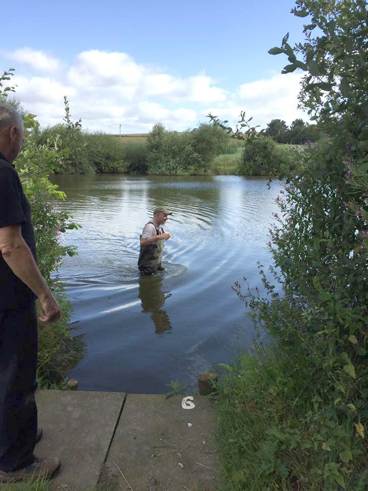 Up to his neck in it